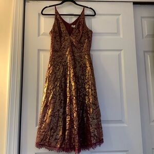 Burgundy and gold lace dress
